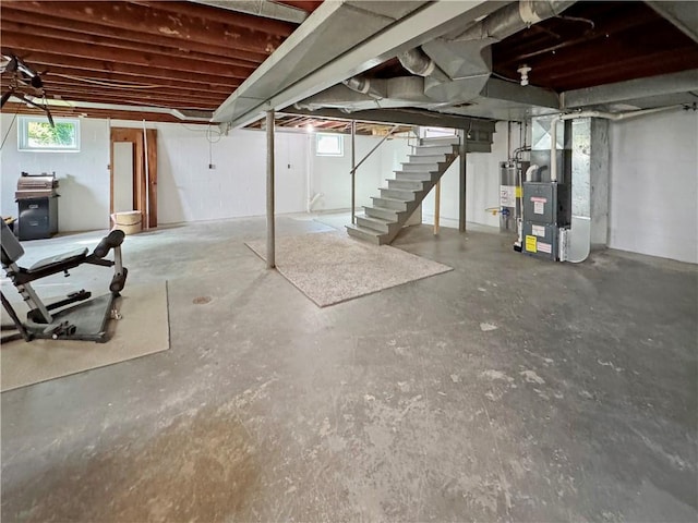 940 Warren Ave, New Castle/4Th, PA 16101 - below grade area with stairway, heating unit, and gas water heater