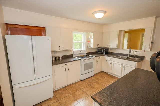 1265 Slippery Rock Rd, Liberty Twp, PA 16057 - kitchen with white appliances, a sink, and dark countertops
