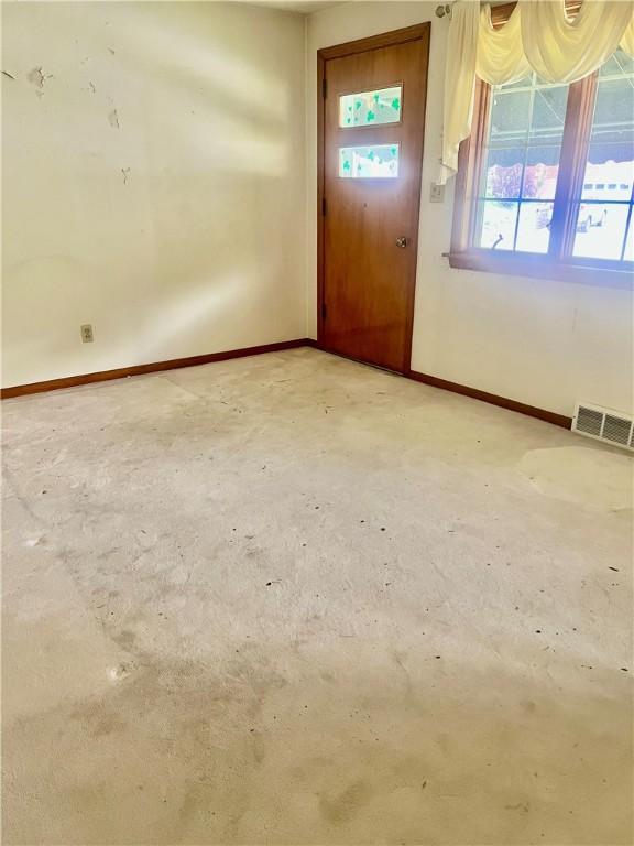 535 Glen Shannon Dr, Castle Shannon, PA 15234 - entrance foyer featuring concrete flooring and baseboards