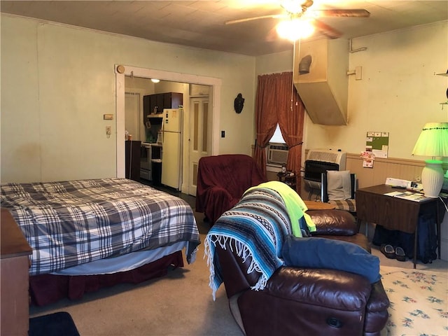 1 S Main St, Fairchance, PA 15437 - carpeted bedroom featuring freestanding refrigerator, a closet, ceiling fan, and cooling unit