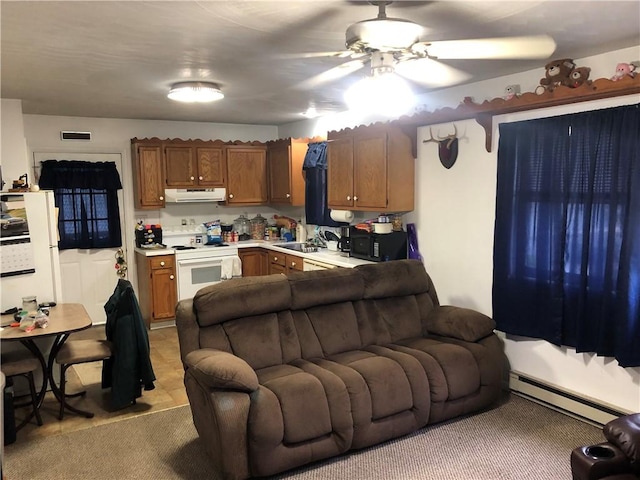 1 S Main St, Fairchance, PA 15437 - kitchen with under cabinet range hood, open floor plan, electric stove, and a baseboard radiator
