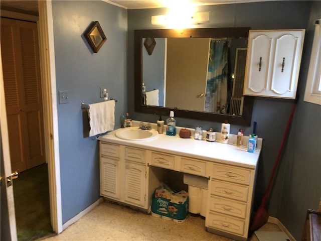 1 S Main St, Fairchance, PA 15437 - bathroom featuring vanity, baseboards, and crown molding