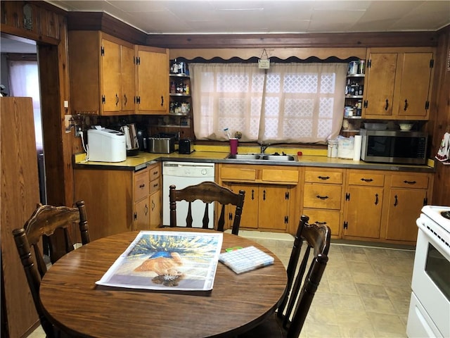 1 S Main St, Fairchance, PA 15437 - kitchen featuring white appliances, open shelves, a sink, and brown cabinets