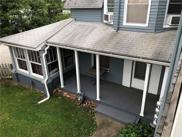 1 S Main St, Fairchance, PA 15437 - view of side of property with a shingled roof, a sunroom, and cooling unit
