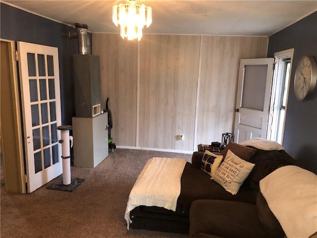 1 S Main St, Fairchance, PA 15437 - living area featuring carpet floors, a chandelier, wood walls, and ornamental molding