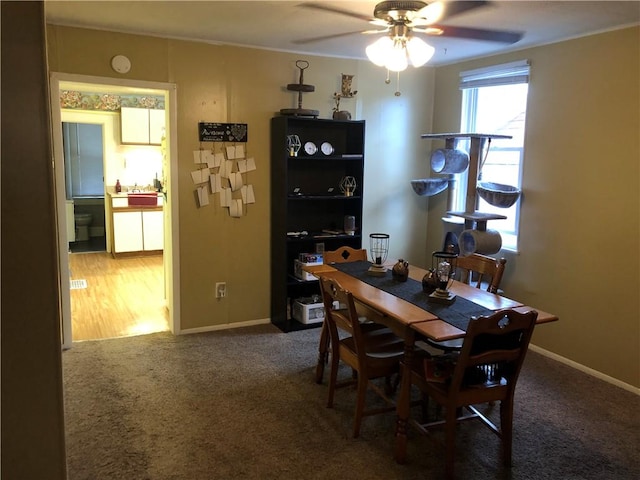 1 S Main St, Fairchance, PA 15437 - carpeted dining space featuring a ceiling fan, crown molding, and baseboards
