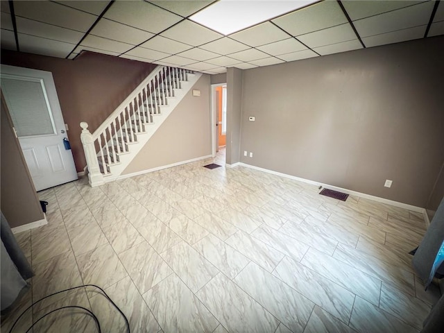 126 W Boyd Ave, City Of But Se, PA 16001 - unfurnished living room featuring stairway, a paneled ceiling, and baseboards