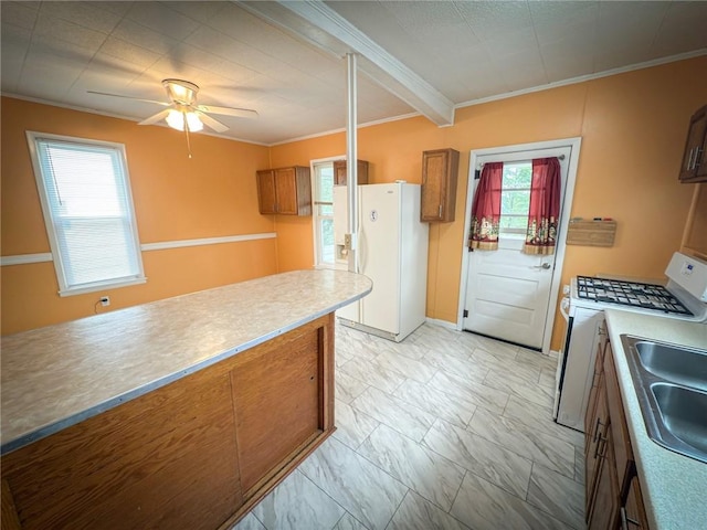 126 W Boyd Ave, City Of But Se, PA 16001 - kitchen featuring white appliances, brown cabinetry, crown molding, light marble finish floors, and ceiling fan