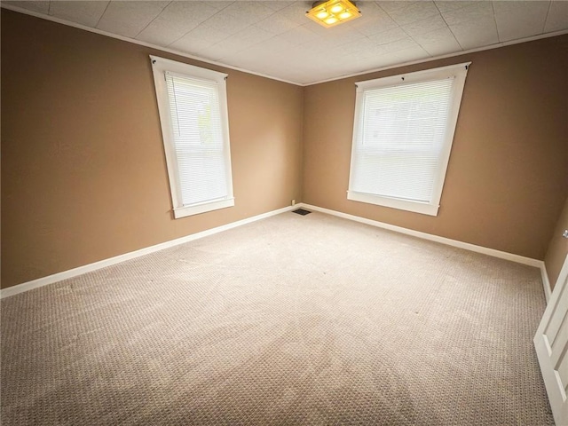 126 W Boyd Ave, City Of But Se, PA 16001 - carpeted empty room featuring healthy amount of natural light, ornamental molding, and baseboards