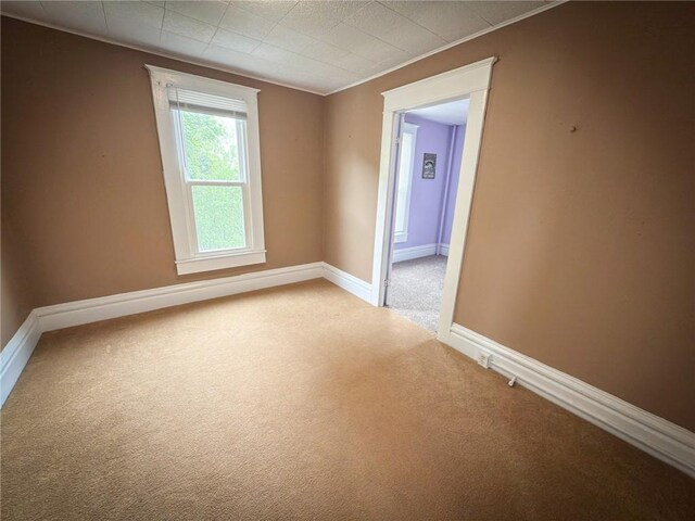 126 W Boyd Ave, City Of But Se, PA 16001 - carpeted spare room featuring baseboards and ornamental molding