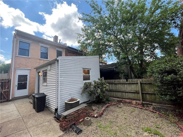 167 S 15th St, South Side, PA 15203 - rear view of house featuring central AC unit and a patio area
