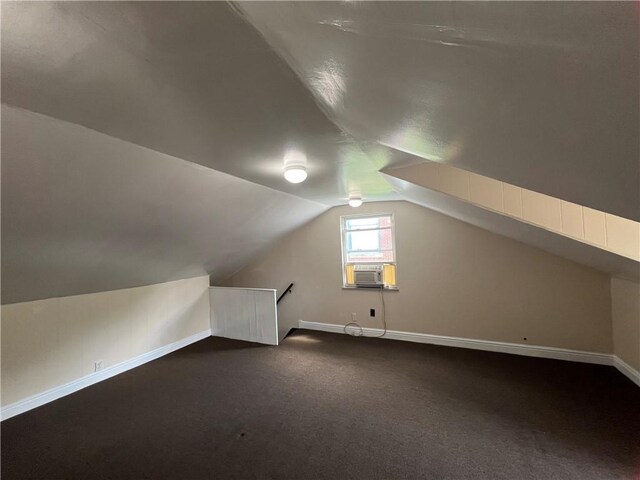 167 S 15th St, South Side, PA 15203 - additional living space with baseboards, lofted ceiling, and dark carpet