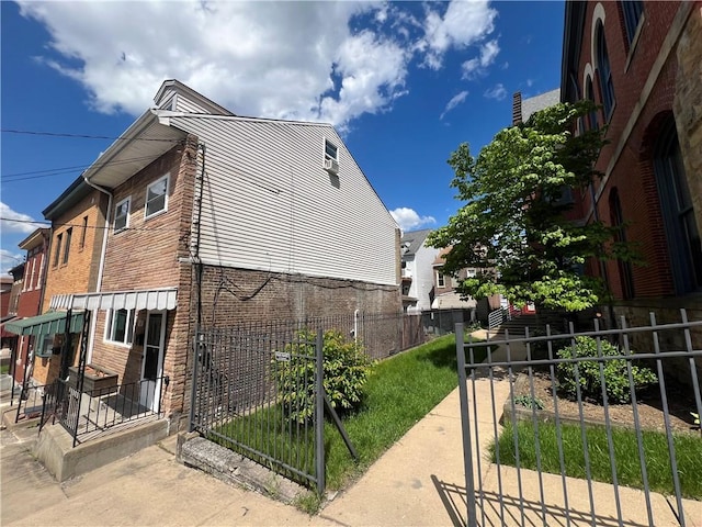 167 S 15th St, South Side, PA 15203 - view of property exterior with brick siding
