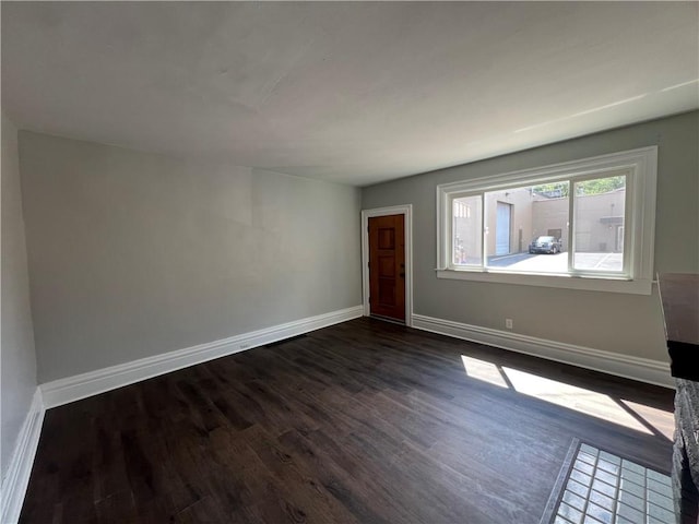 167 S 15th St, South Side, PA 15203 - spare room featuring dark wood-style flooring and baseboards