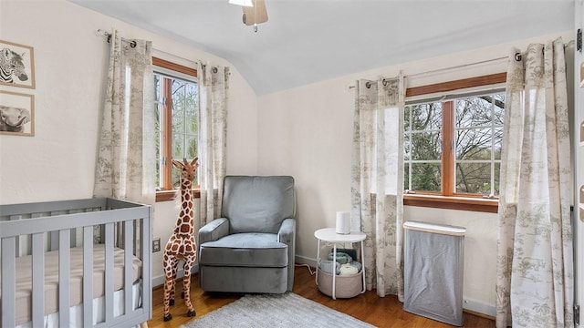 4720 Rolling Hills Rd, Whitehall, PA 15236 - bedroom featuring a nursery area, lofted ceiling, wood finished floors, a ceiling fan, and baseboards