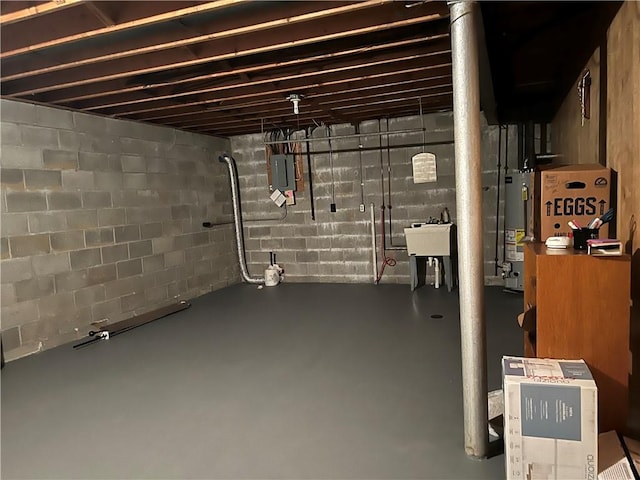 286 Windsor Rdg Unit 26, Neshannock Twp, PA 16105 - unfinished basement with gas water heater, a sink, and electric panel