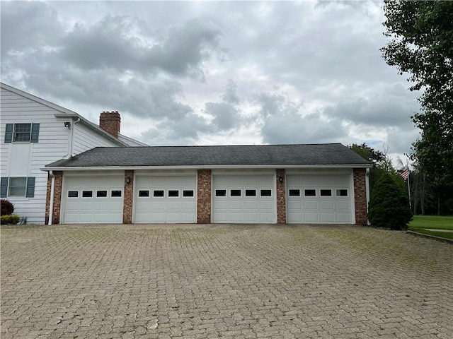286 Windsor Rdg Unit 26, Neshannock Twp, PA 16105 - garage featuring decorative driveway