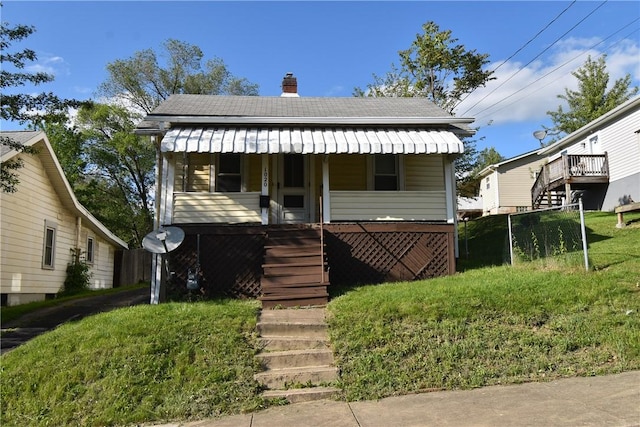 1020 Arch St, City Of Washington, PA 15301 - bungalow-style home with stairway, a chimney, and roof with shingles