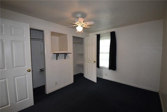 1020 Arch St, City Of Washington, PA 15301 - unfurnished bedroom featuring dark colored carpet, baseboards, ceiling fan, and a textured ceiling