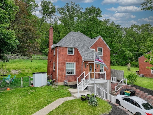 216 Siebert, Ross Twp, PA 15237 - view of front of home featuring brick siding, a chimney, roof with shingles, a gate, and an outbuilding