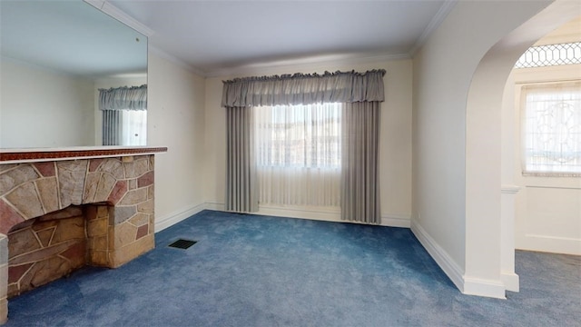 2120 Delaware Ave, Swissvale, PA 15218 - unfurnished living room with carpet flooring, plenty of natural light, arched walkways, crown molding, and baseboards