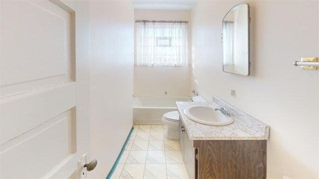 2120 Delaware Ave, Swissvale, PA 15218 - bathroom featuring toilet, tile patterned floors, vanity, and a bath