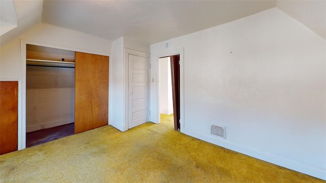 2120 Delaware Ave, Swissvale, PA 15218 - unfurnished bedroom featuring vaulted ceiling, carpet floors, and a closet