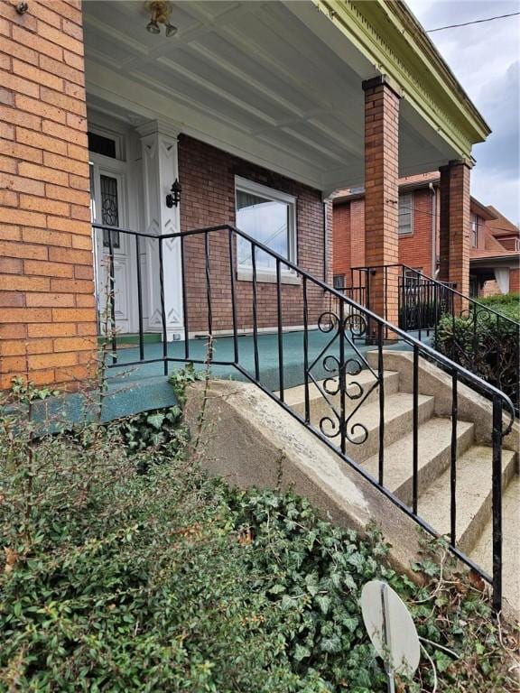 2120 Delaware Ave, Swissvale, PA 15218 - view of property exterior with brick siding and a porch