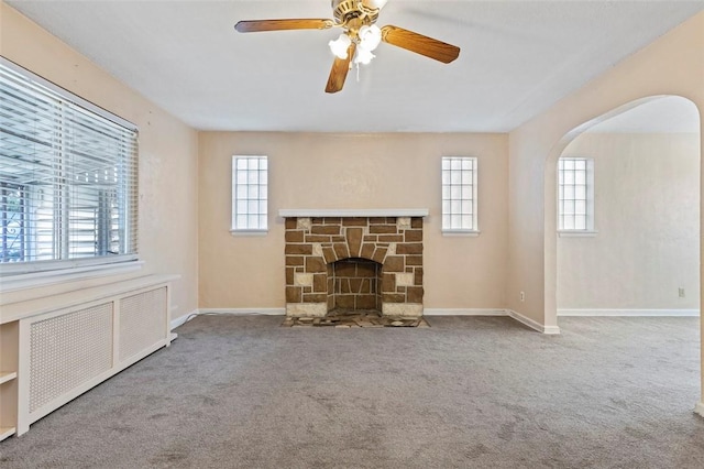 2238 Lucina Ave, Overbrook, PA 15210 - unfurnished living room with radiator heating unit, plenty of natural light, and carpet floors