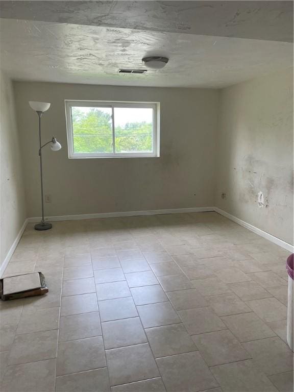 241 Willow Dr, Monroeville, PA 15146 - tiled spare room with baseboards