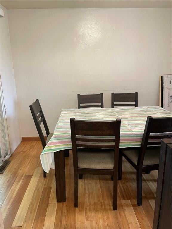 241 Willow Dr, Monroeville, PA 15146 - dining space with light wood-style flooring and baseboards