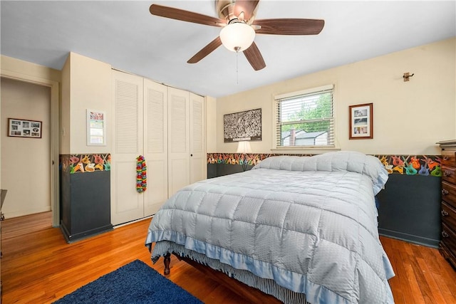 3329 Forest Rd, Bethel Park, PA 15102 - bedroom with a closet, wood finished floors, and a ceiling fan