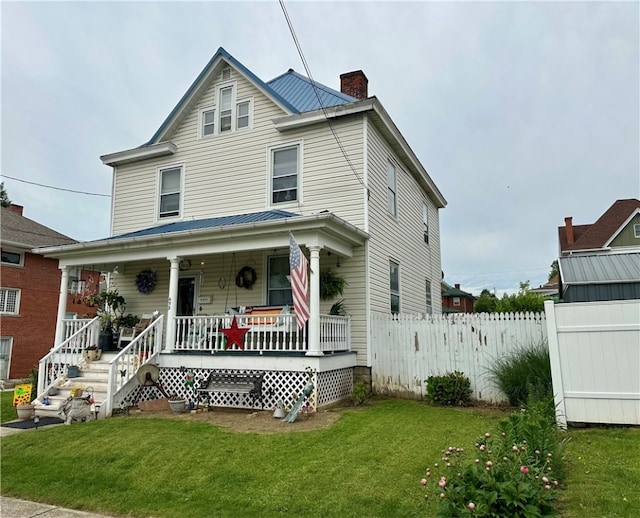 453 N W St, Waynsbrg/Frankln Twp, PA 15370 - view of front of property featuring a chimney and covered porch