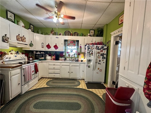453 N W St, Waynsbrg/Frankln Twp, PA 15370 - kitchen featuring white appliances, under cabinet range hood, a sink, light floors, and white cabinetry