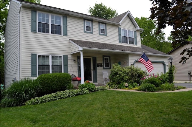 319 Hummingbird Cir, Cranberry Twp, PA 16066 - view of front of home with a front lawn and an attached garage