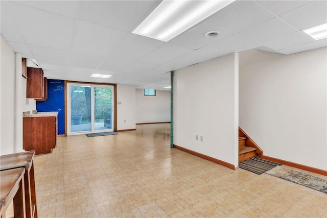 319 Hummingbird Cir, Cranberry Twp, PA 16066 - unfurnished room with a paneled ceiling, baseboards, and stairway