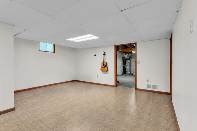 319 Hummingbird Cir, Cranberry Twp, PA 16066 - unfurnished room featuring gas water heater, baseboards, and a drop ceiling