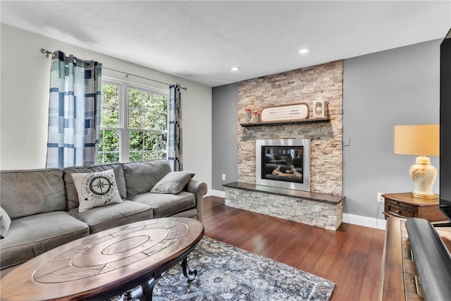 319 Hummingbird Cir, Cranberry Twp, PA 16066 - living area featuring a stone fireplace, wood finished floors, baseboards, and recessed lighting