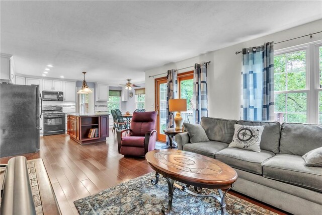 319 Hummingbird Cir, Cranberry Twp, PA 16066 - living room featuring ceiling fan, plenty of natural light, dark wood-style flooring, and recessed lighting