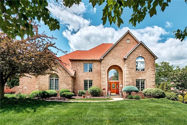 133 Ridgemont Dr, Cranberry Twp, PA 16066 - traditional home with brick siding and a front yard