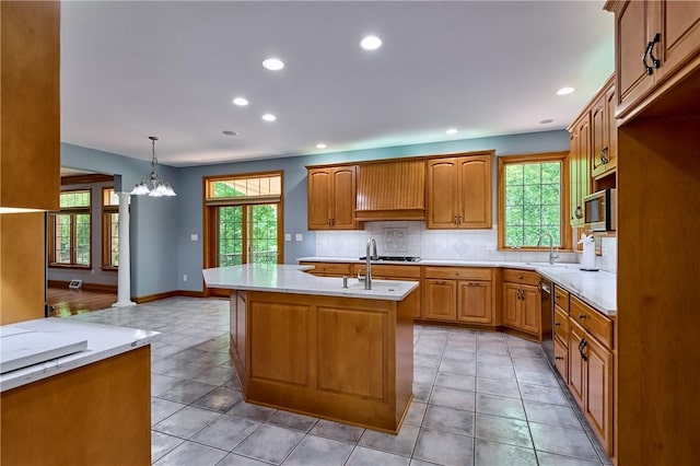 133 Ridgemont Dr, Cranberry Twp, PA 16066 - kitchen with a chandelier, a sink, dishwasher, recessed lighting, and backsplash