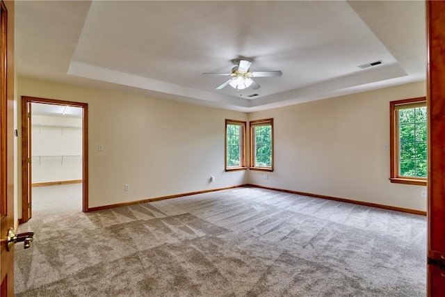 133 Ridgemont Dr, Cranberry Twp, PA 16066 - spare room with a tray ceiling, a ceiling fan, and carpet floors