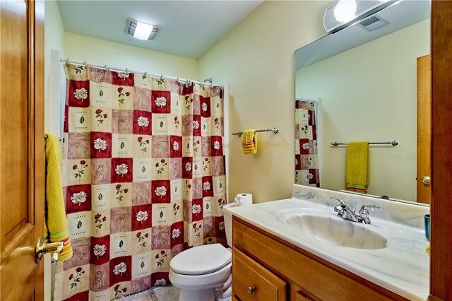 133 Ridgemont Dr, Cranberry Twp, PA 16066 - bathroom featuring vanity, toilet, and curtained shower