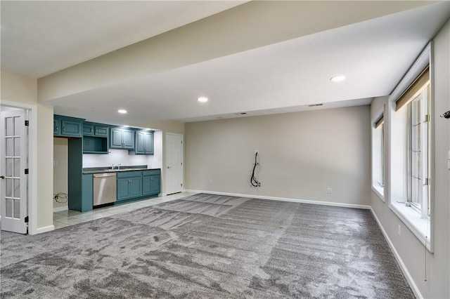 133 Ridgemont Dr, Cranberry Twp, PA 16066 - kitchen with light colored carpet, dishwasher, baseboards, blue cabinets, and recessed lighting