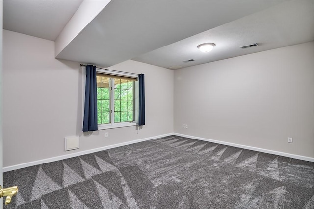 133 Ridgemont Dr, Cranberry Twp, PA 16066 - empty room featuring dark colored carpet and baseboards