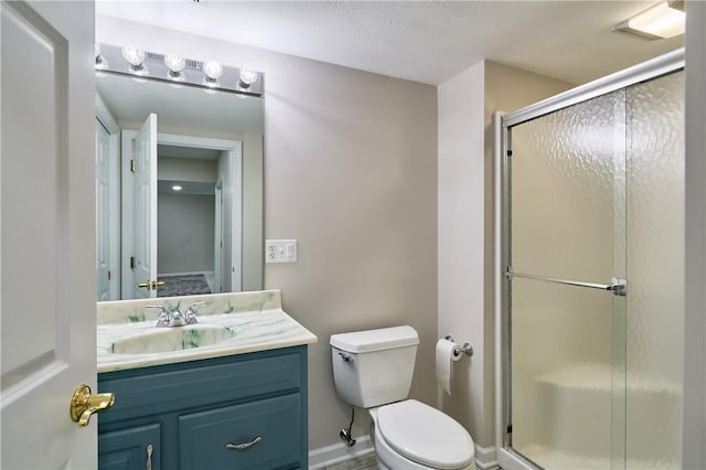 133 Ridgemont Dr, Cranberry Twp, PA 16066 - full bathroom with a shower stall, toilet, vanity, and baseboards