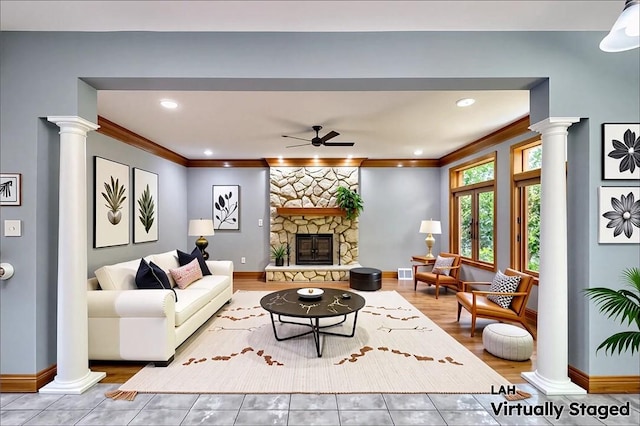 133 Ridgemont Dr, Cranberry Twp, PA 16066 - tiled living room with ornate columns, a ceiling fan, ornamental molding, baseboards, and recessed lighting