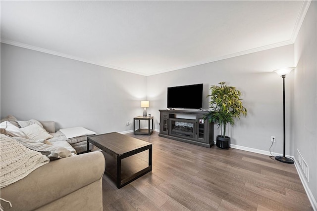 48 Glenmore Ave, West View, PA 15229 - living room featuring ornamental molding, baseboards, wood finished floors, and a fireplace