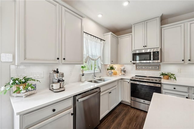 436 Greenwood Dr, North Strabane, PA 15317 - kitchen with appliances with stainless steel finishes, a sink, tasteful backsplash, light countertops, and recessed lighting
