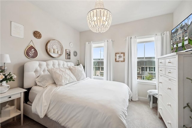 436 Greenwood Dr, North Strabane, PA 15317 - carpeted bedroom with a chandelier and baseboards